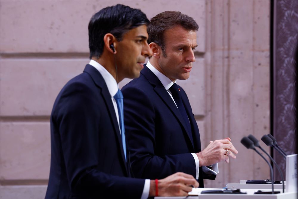 PM Rishi Sunak and French President Emmanuel Macron speaking in Paris
